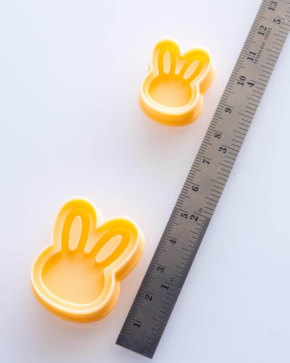 Mini Bunny Head clay cutters shown with a ruler or size lineup to provide a practical scale reference.