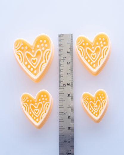 Boho Folk Heart clay cutters shown with a ruler or size lineup to provide a practical scale reference.