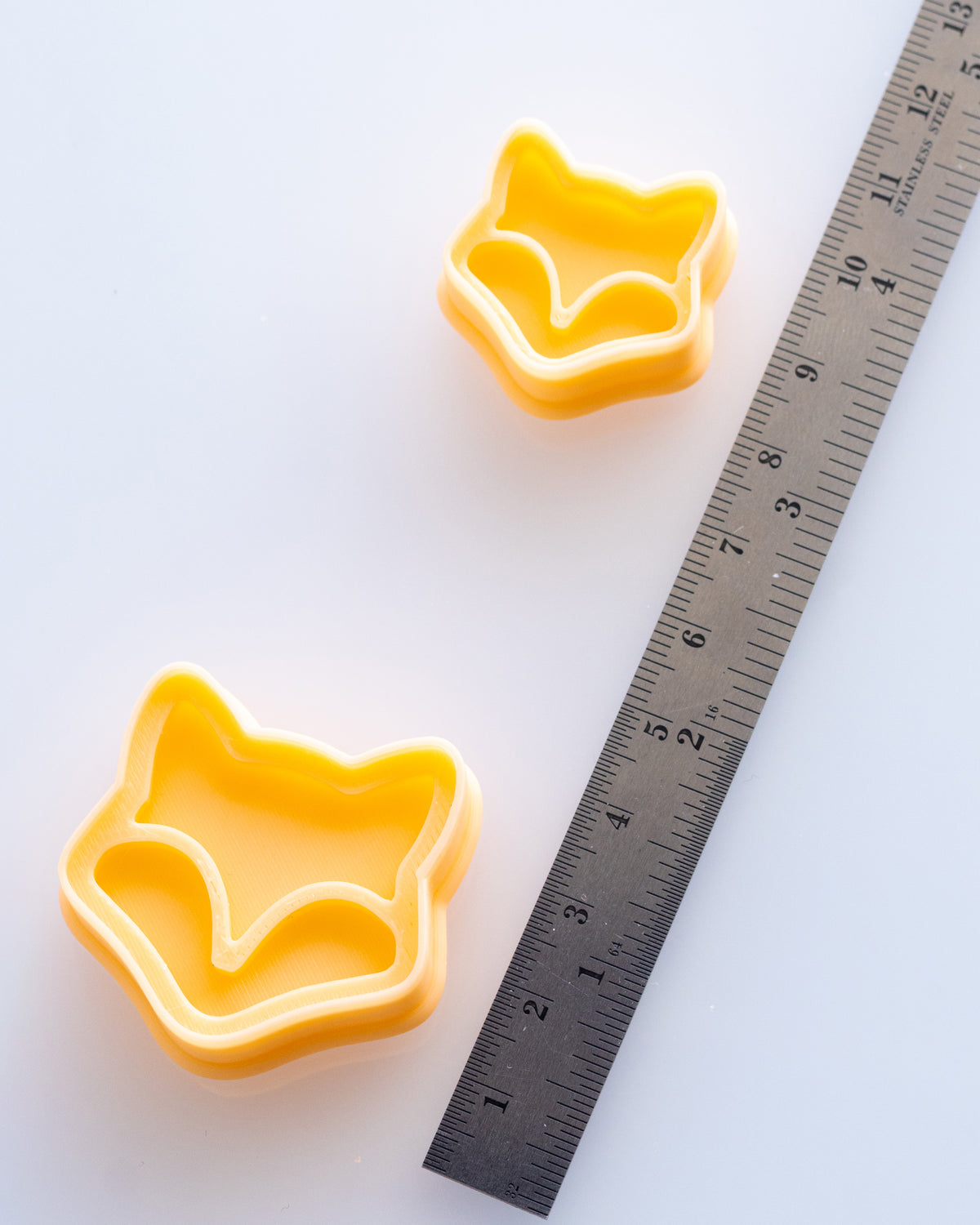 Mini Fox Face clay cutters shown with a ruler or size lineup to provide a practical scale reference.