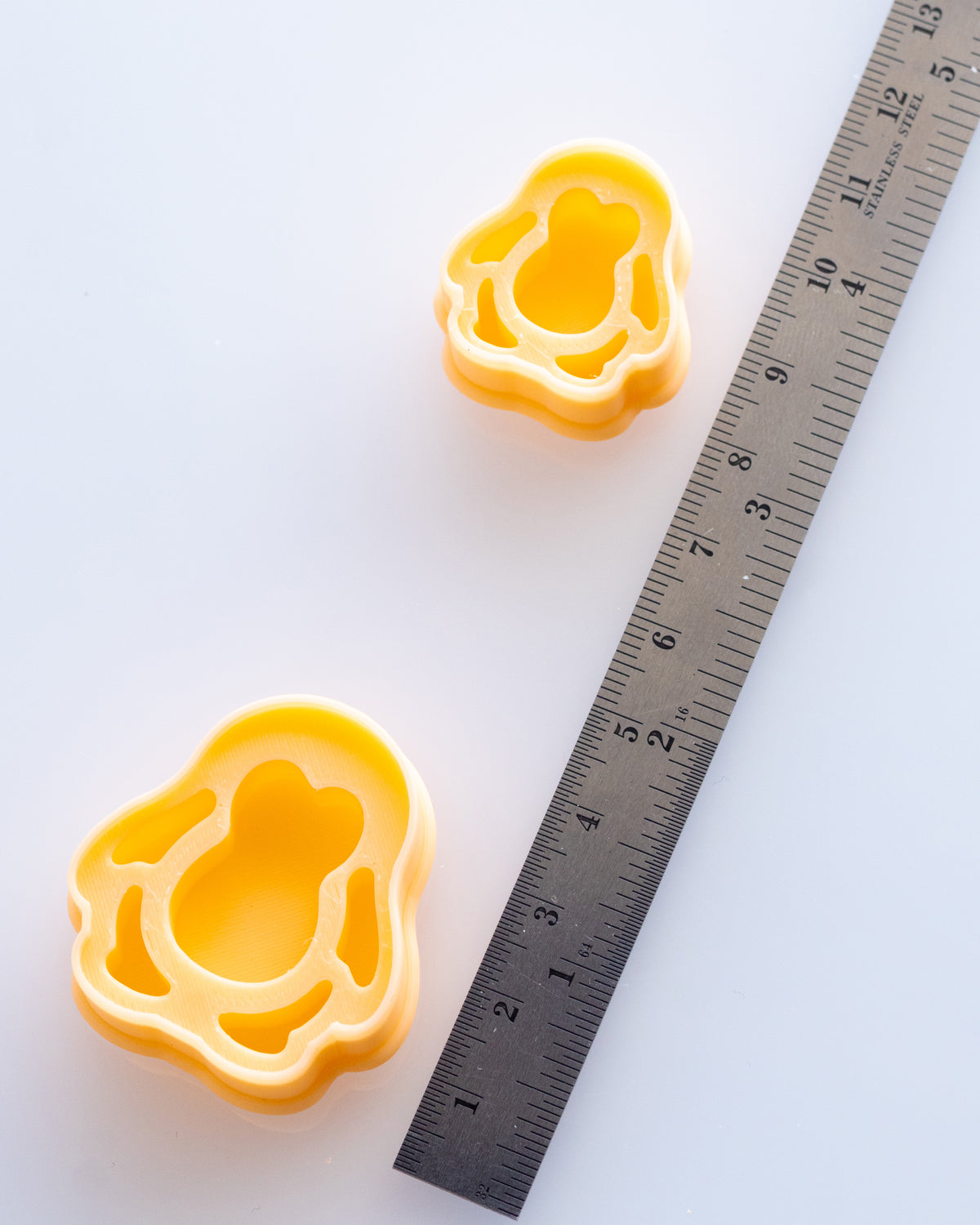 Mini Penguin clay cutters shown with a ruler or size lineup to provide a practical scale reference.