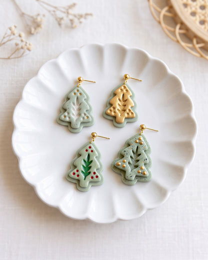 Close view of finished polymer clay jewelry made with the Nordic Folk Winter Pine cutter design.