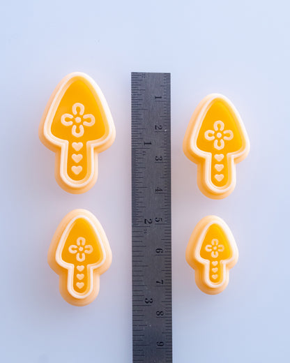 Scandi Folk Heart Mushroom clay cutters shown with a ruler or size lineup to provide a practical scale reference.